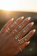 All rings stacked on hand