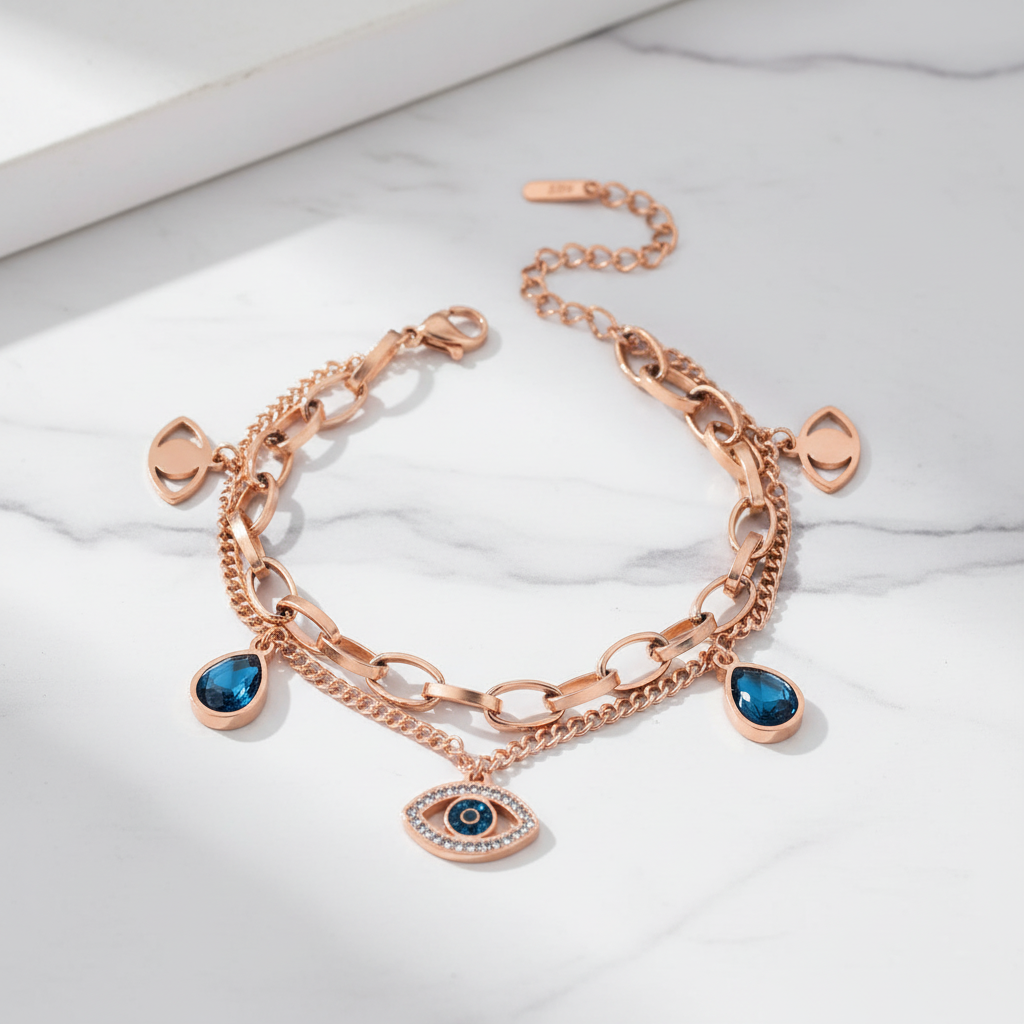 Rose gold evil eye bracelet on marble surface